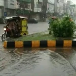 Heavy monsoon rainfall causing waterlogging on Lahore roads and slippery traffic on Motorway