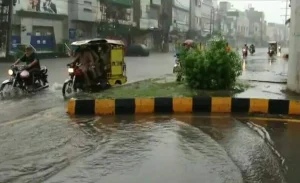 Heavy monsoon rainfall causing waterlogging on Lahore roads and slippery traffic on Motorway